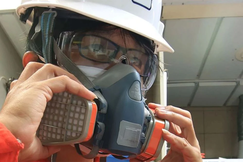 Industrial worker in a controlled workplace environment